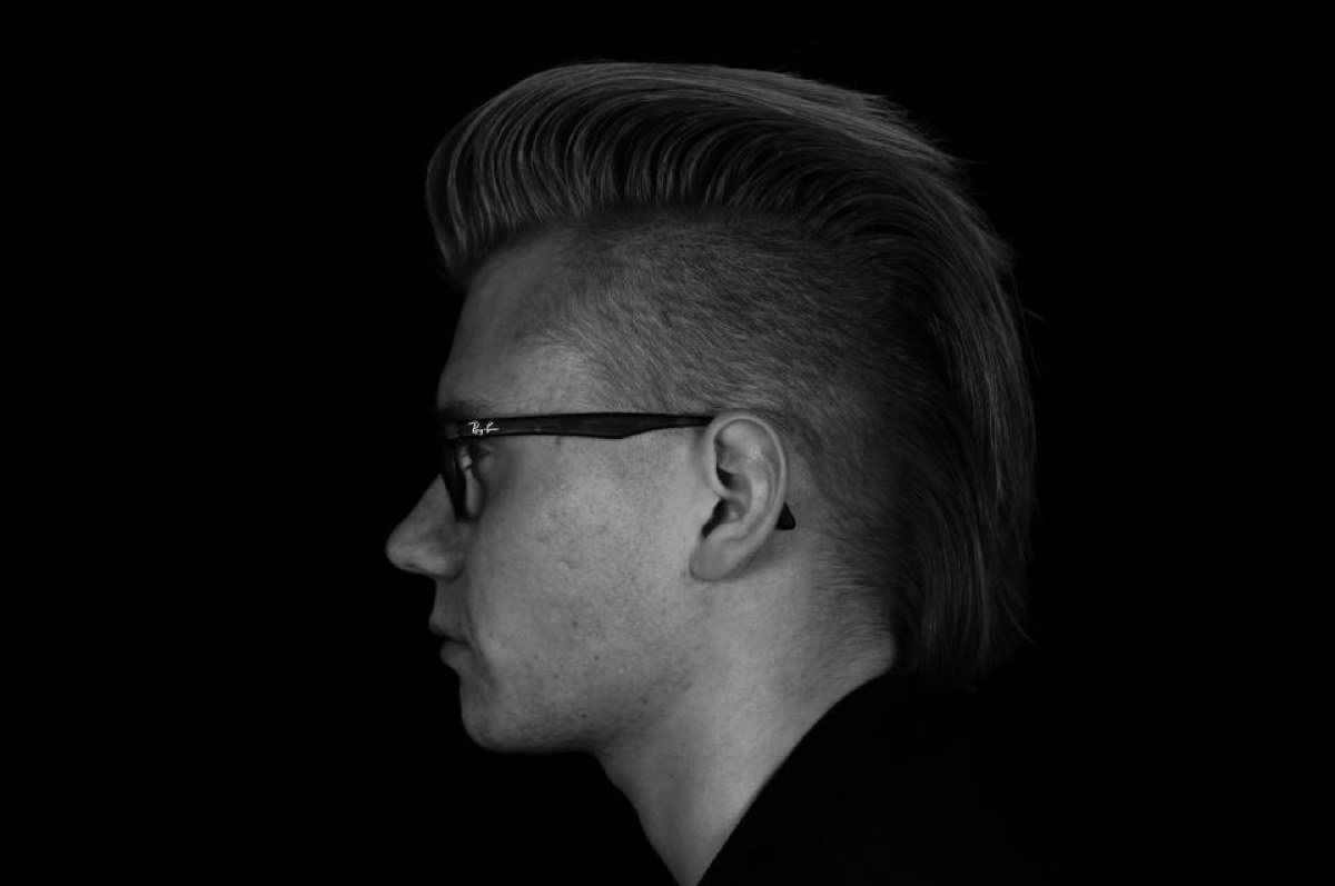 Side profile of a sharp haircut