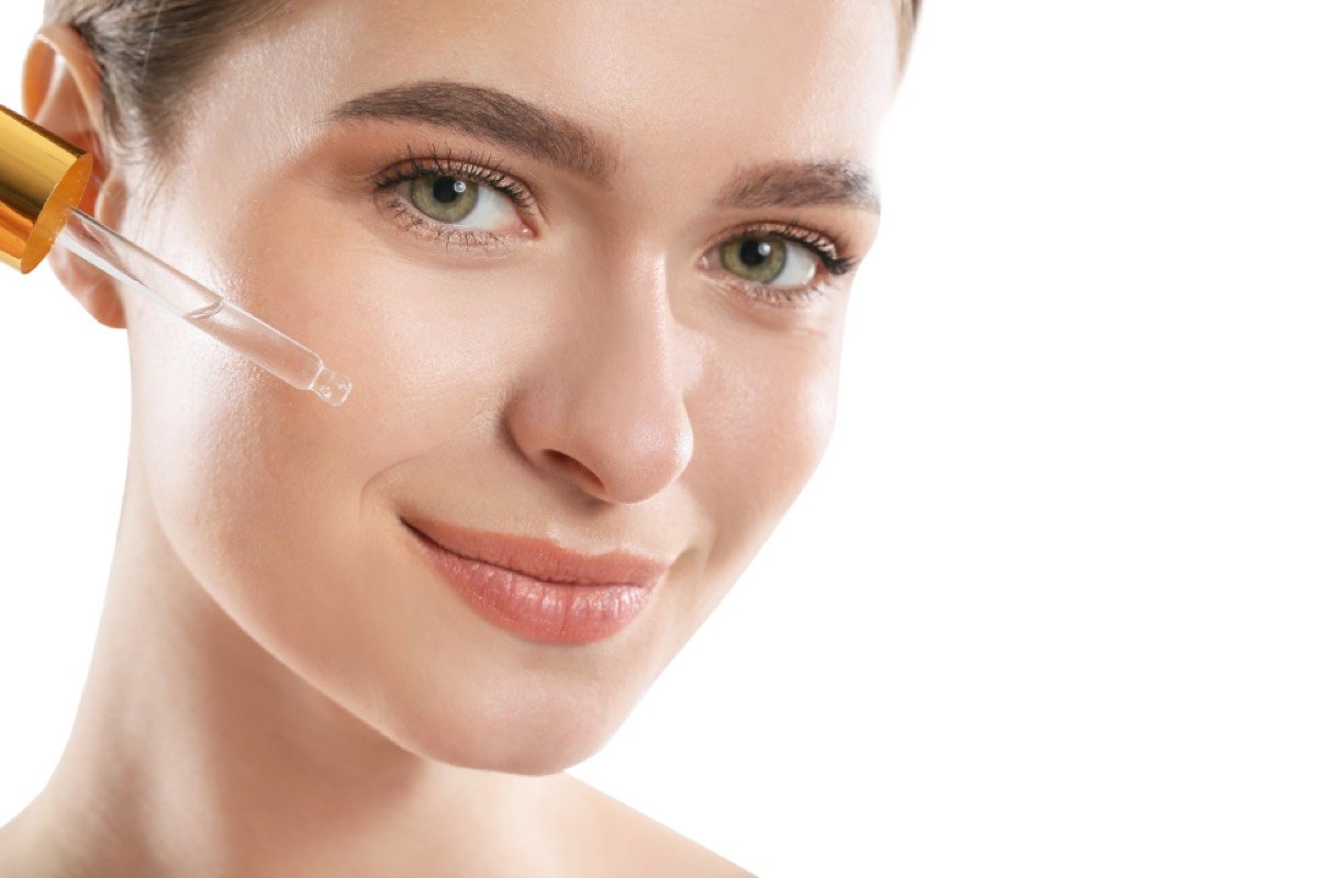 Woman smiling after a skin treatment